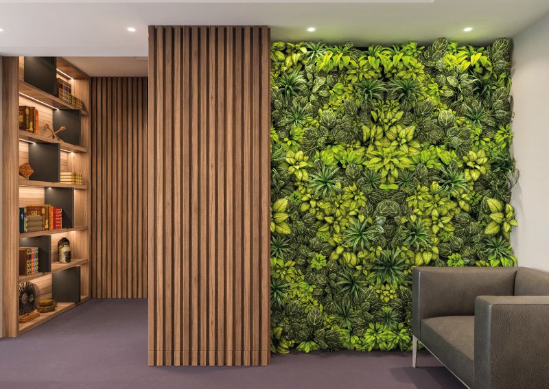 an accent wall comprised of greenery